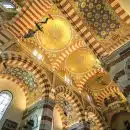 a large domed ceiling with a clock