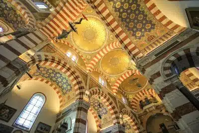 a large domed ceiling with a clock