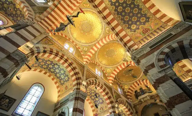 a large domed ceiling with a clock