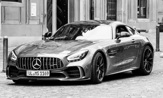 grayscale photo of mercedes benz coupe